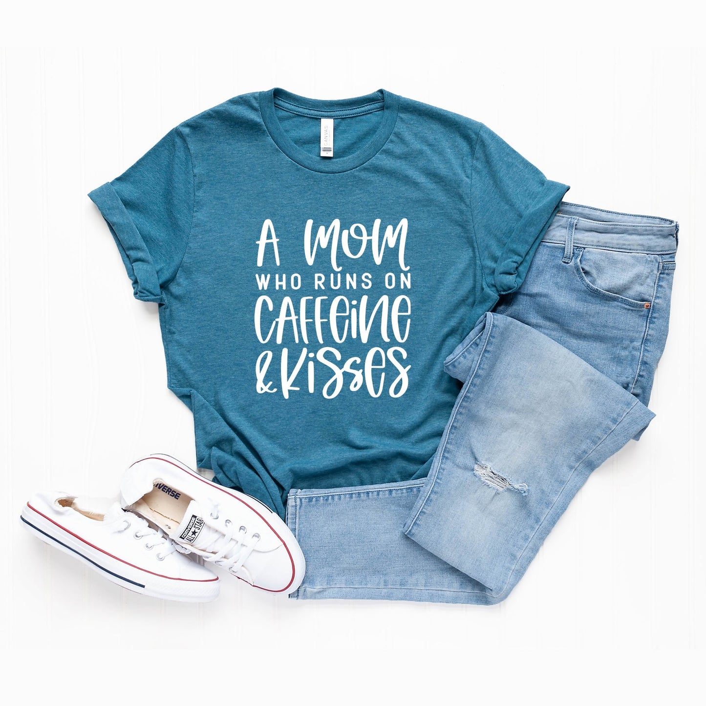 A Mom Who Runs On Caffeine And Kisses | Short Sleeve Crew Neck