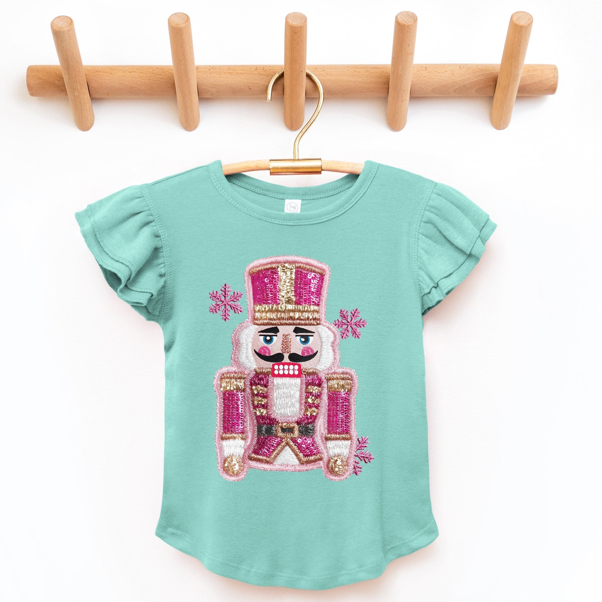 Pink Snowflake Nutcracker Patchwork Print - Flutter Sleeve Graphic T-Shirt