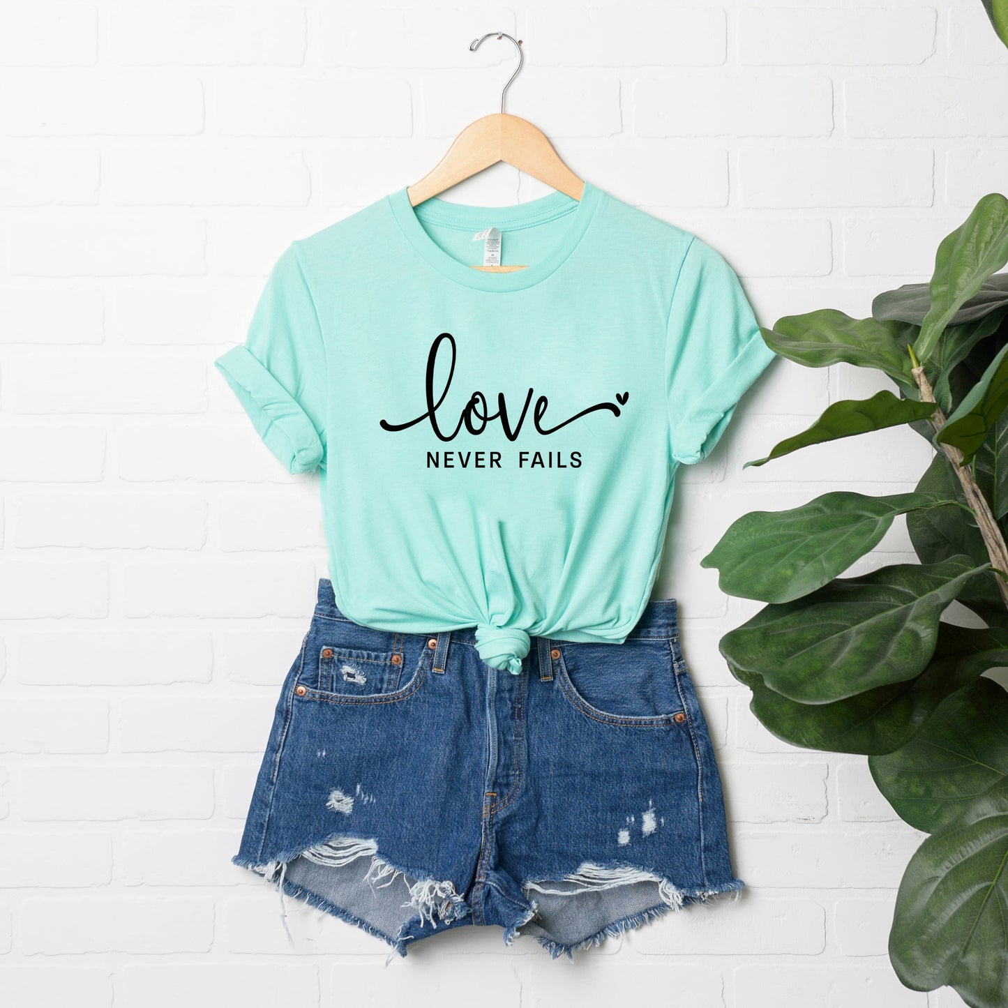 Love Never Fails | Short Sleeve Crew Neck