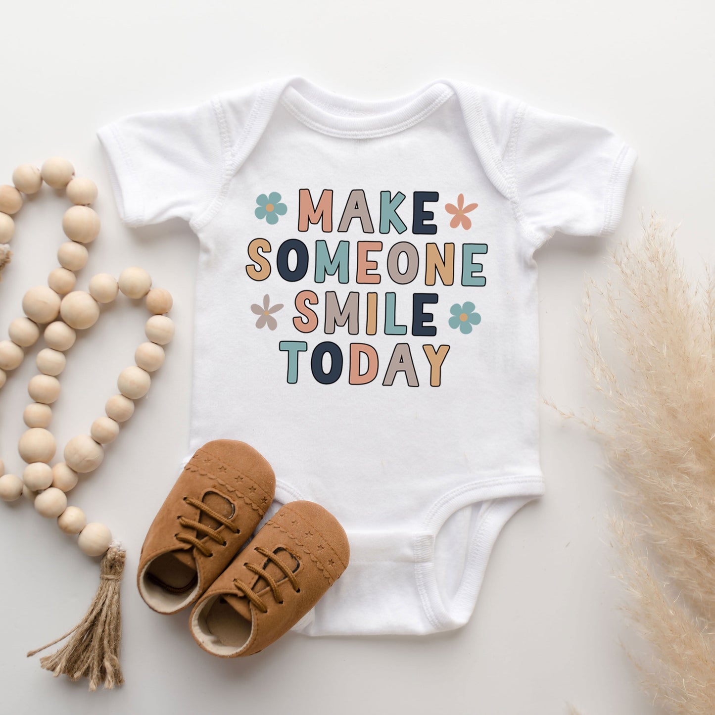Make Someone Smile Today | Baby Graphic Short Sleeve Onesie