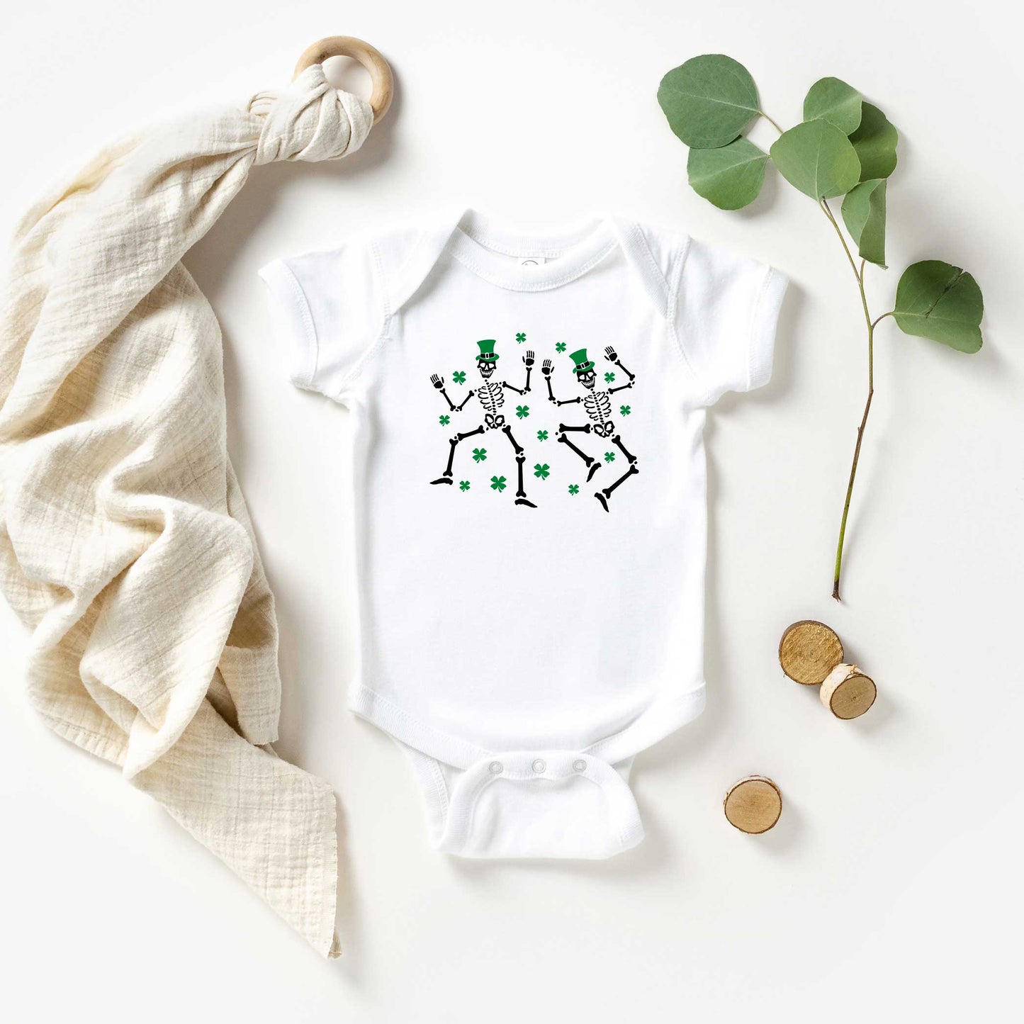 Shamrocks And Dancing Skeletons | Baby Graphic Short Sleeve Onesie