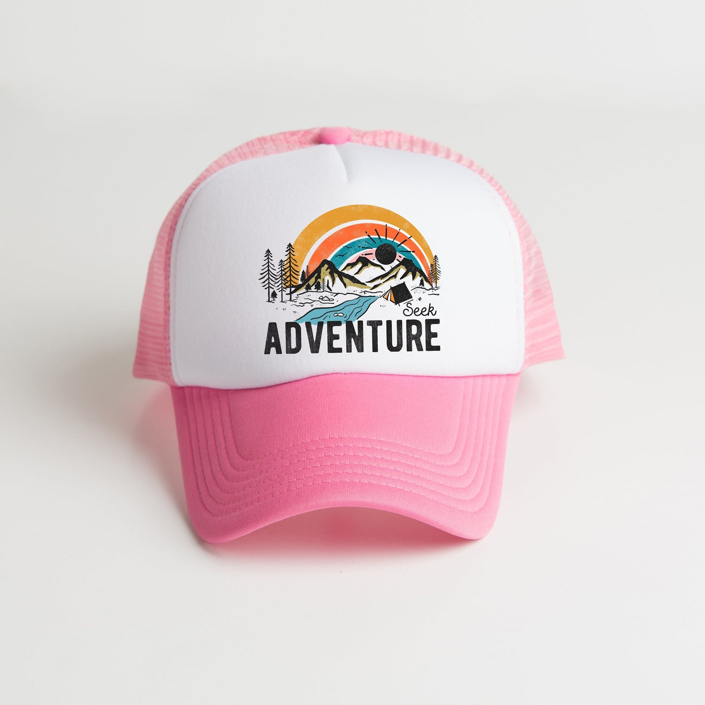 a pink and white hat with the words adventure on it