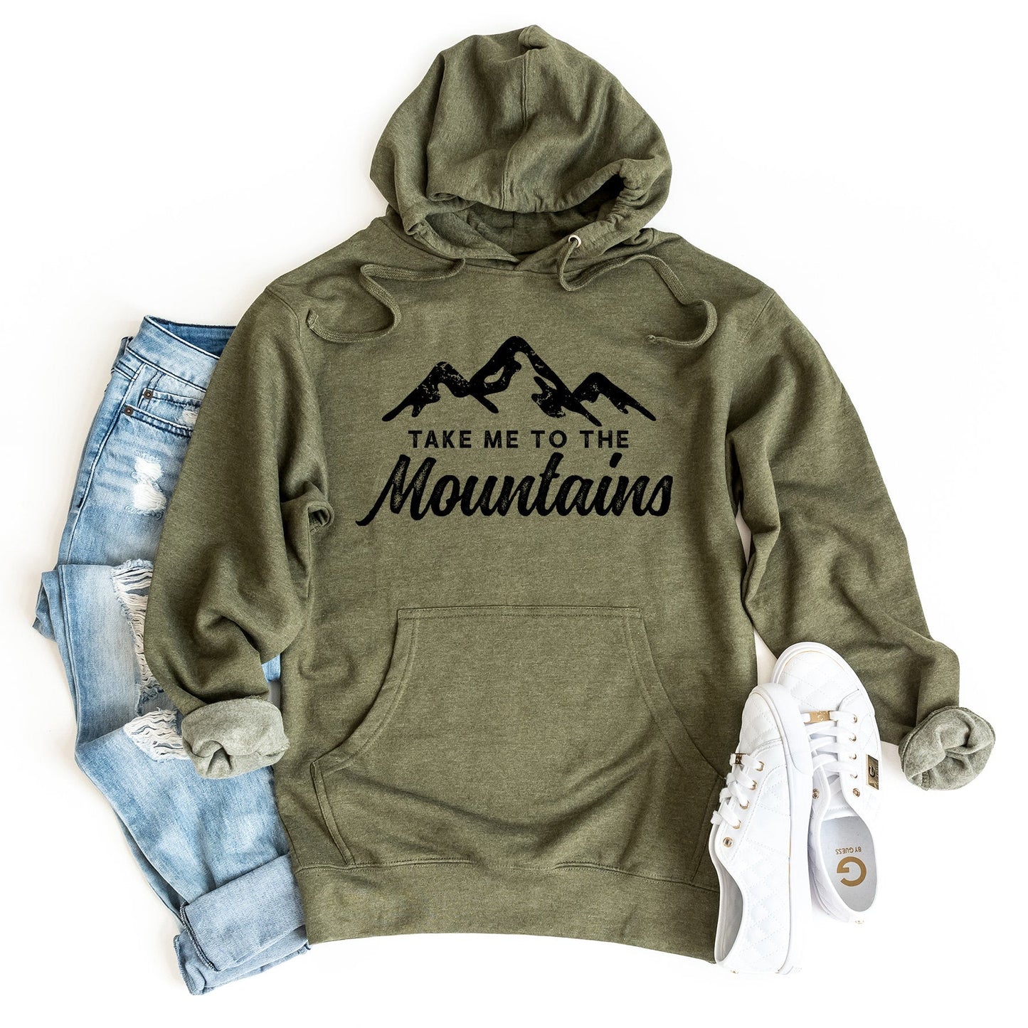 a green sweatshirt with the words take me to the mountains on it